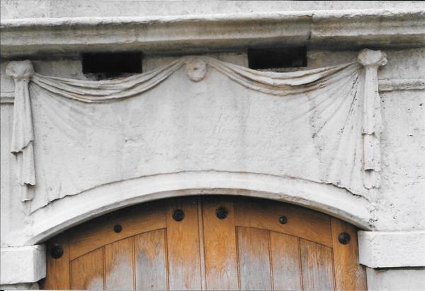 Fitzpatrick, detail of carving over entrance